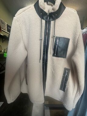 Cream Sherpa Jacket with Black Trim and Zipper Details